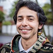 Josue tour guide Portrait of Josué Alomoto, he is the co-host of this experience,:Walking food tour.